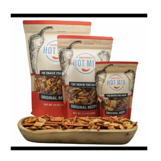 Three packages of Kentucky Hot Mix snack mix on a white background